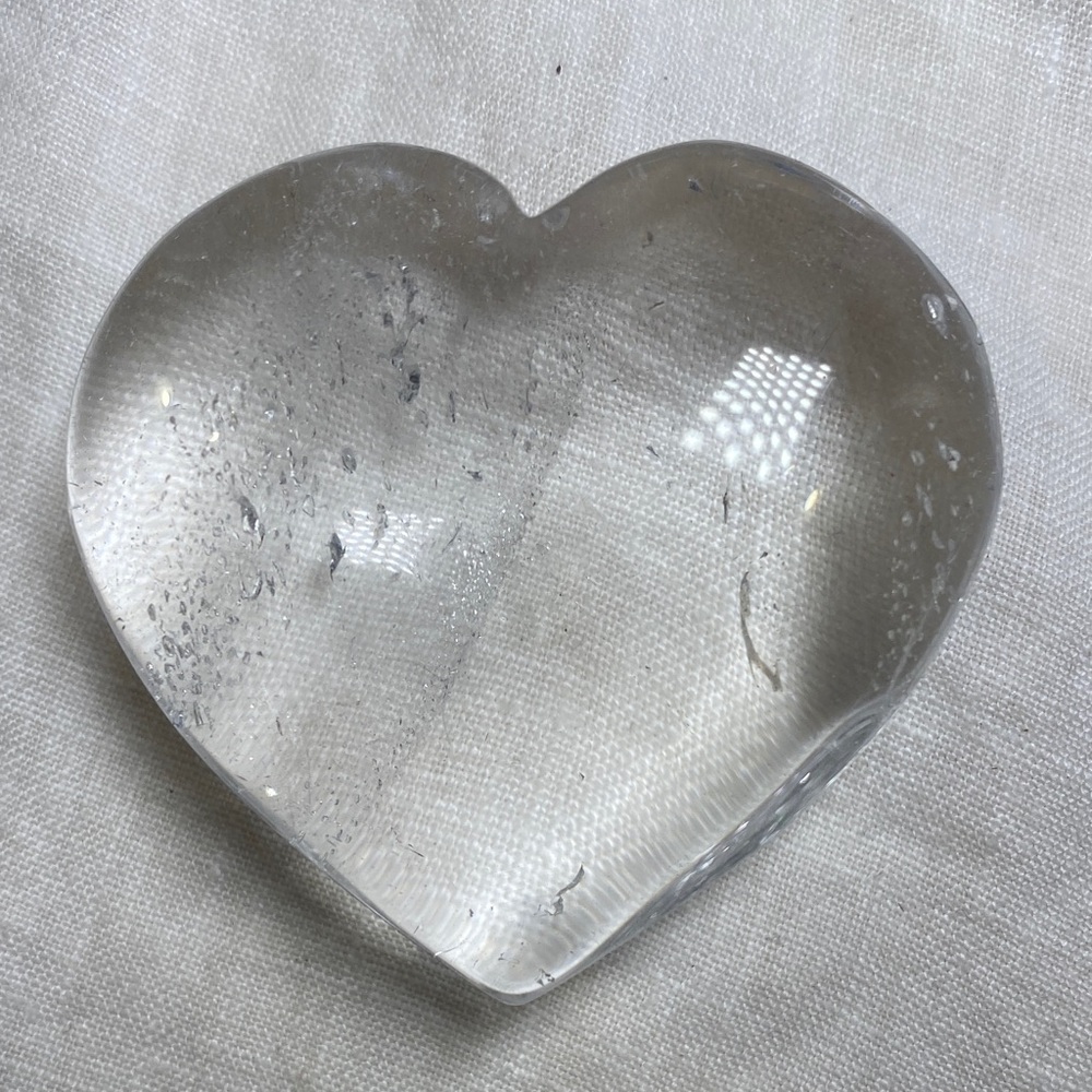 Clear quartz heart shaped polished carving